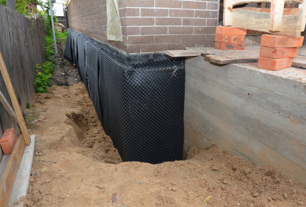 SJ Waterproofing Pros technician performing targeted Crawl Space Encapsulation assessment in Raymond, IL